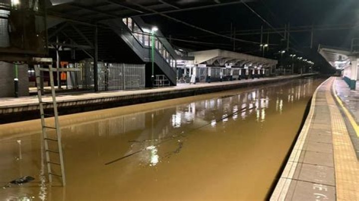 
Australian train derails from flooded tracks in horrific scene 