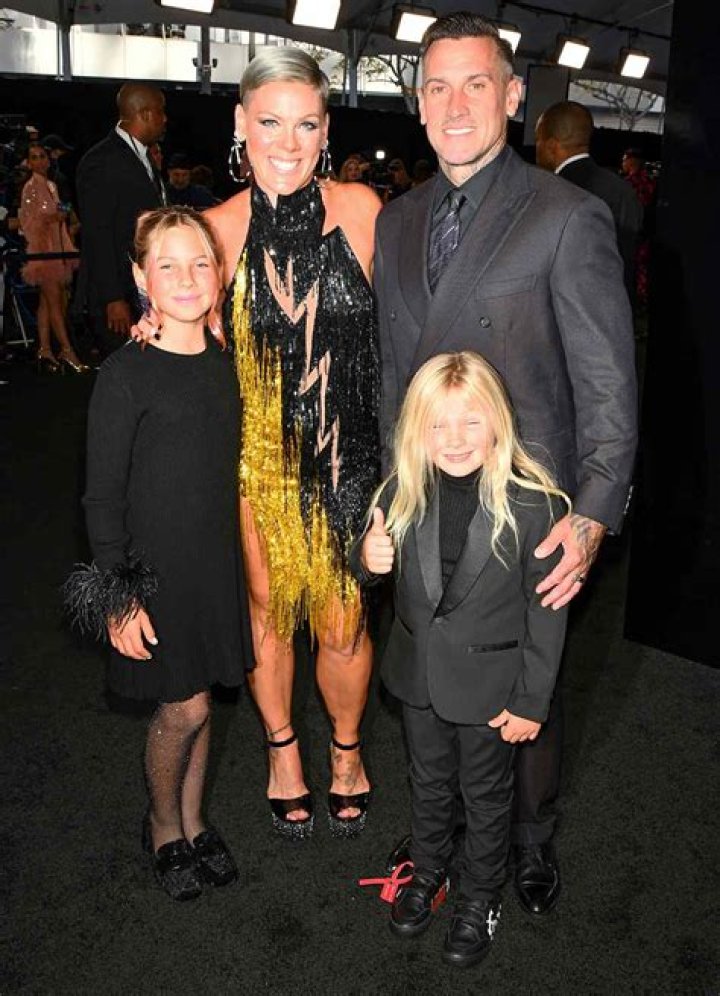 
Pink Hits the 2022 AMAs Red Carpet with Husband Carey Hart and Their Two Kids 
