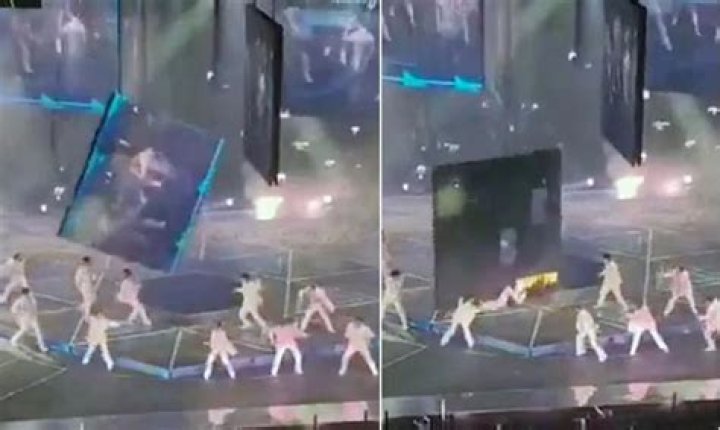 
video footage of a giant screen falling during a concert in Hong Kong featuring Mirror Boy Band 